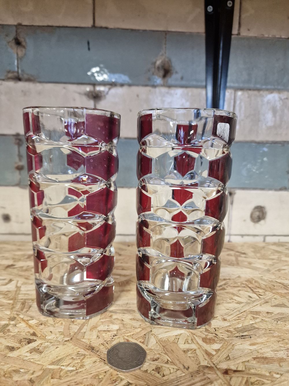 Lot 332: A pair of french heavy ruby and Glass vases