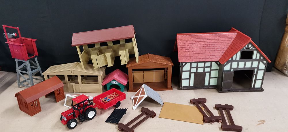 Lot 165: A Collection of Plastic Toy Farm Buildings and Accessories