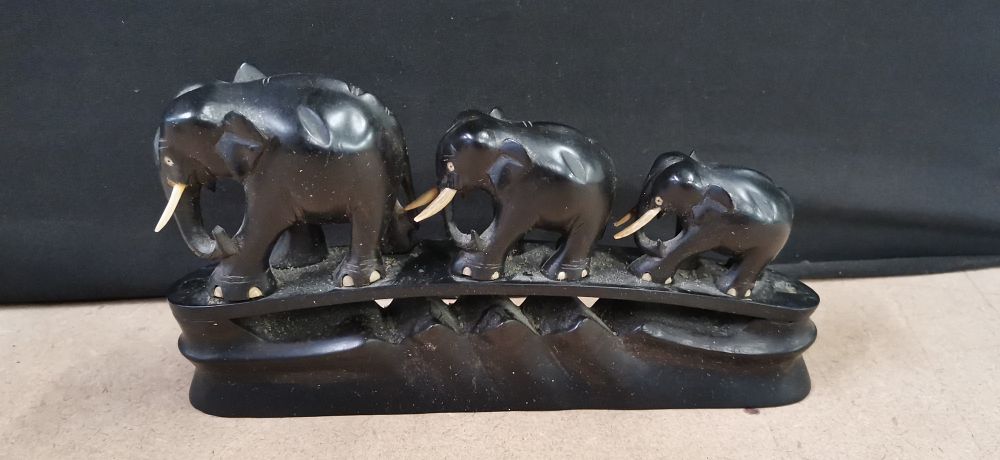 Lot 263: Three Graduated Carved Ebony Elephants on Base