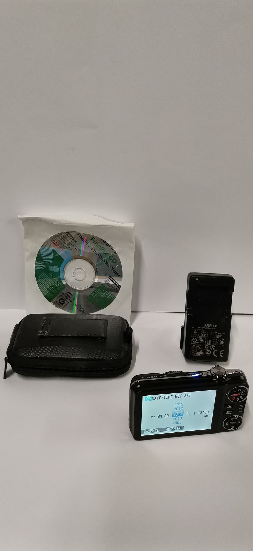 Lot 266: Fujifilm FinePix T 14-Megapixel Digital Camera with Accessories
