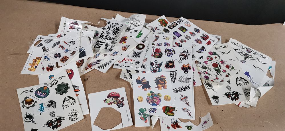 Lot 299: A Collection of Multicoloured Temporary Tattoo Sheets