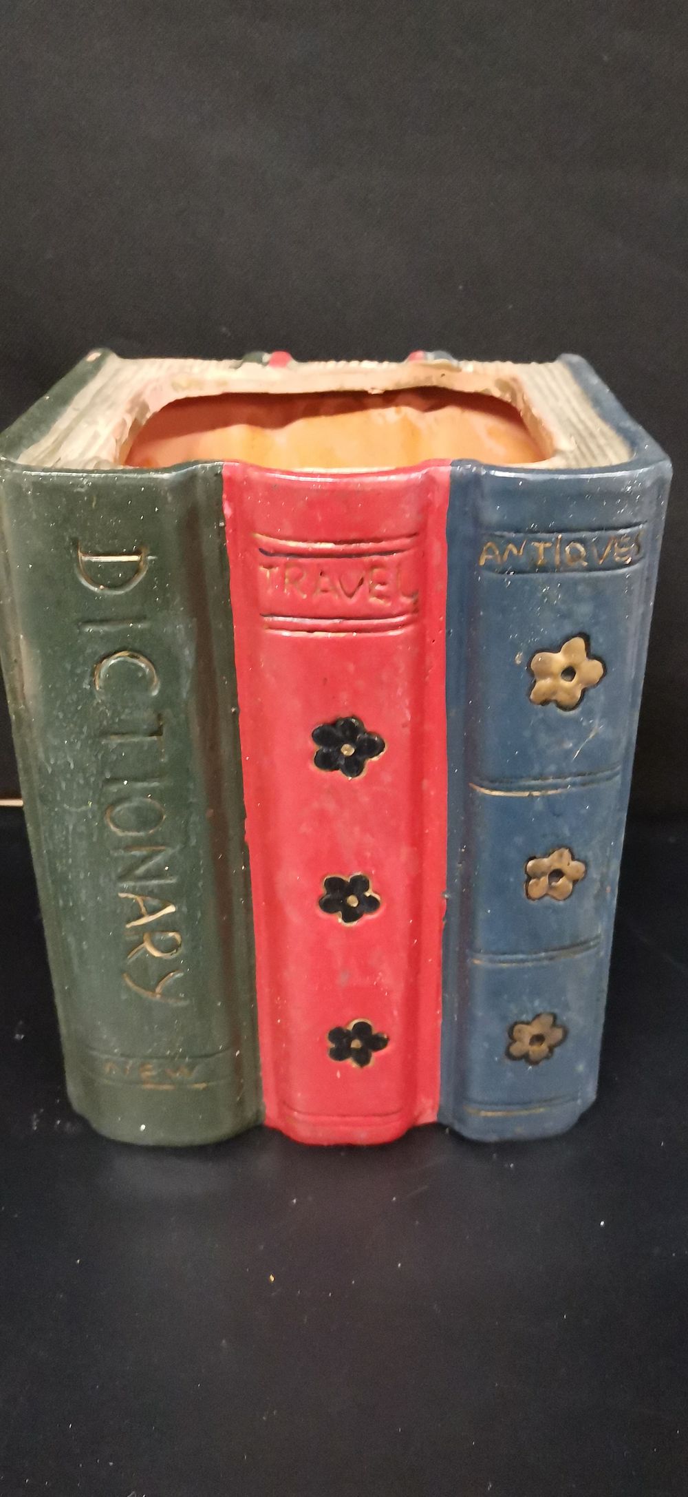 Lot 190: A Ceramic Trio of Books Shaped Planter