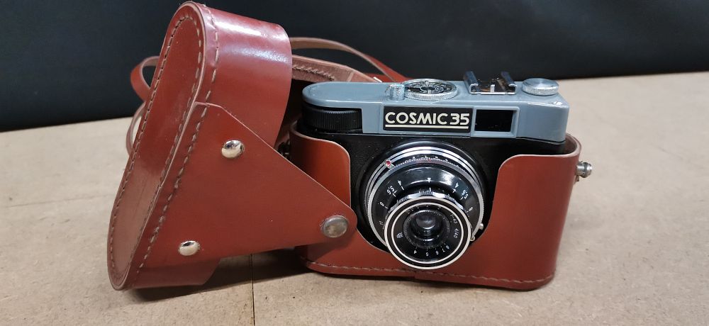 Lot 202: Vintage Cosmic 35 Camera with Leather Case