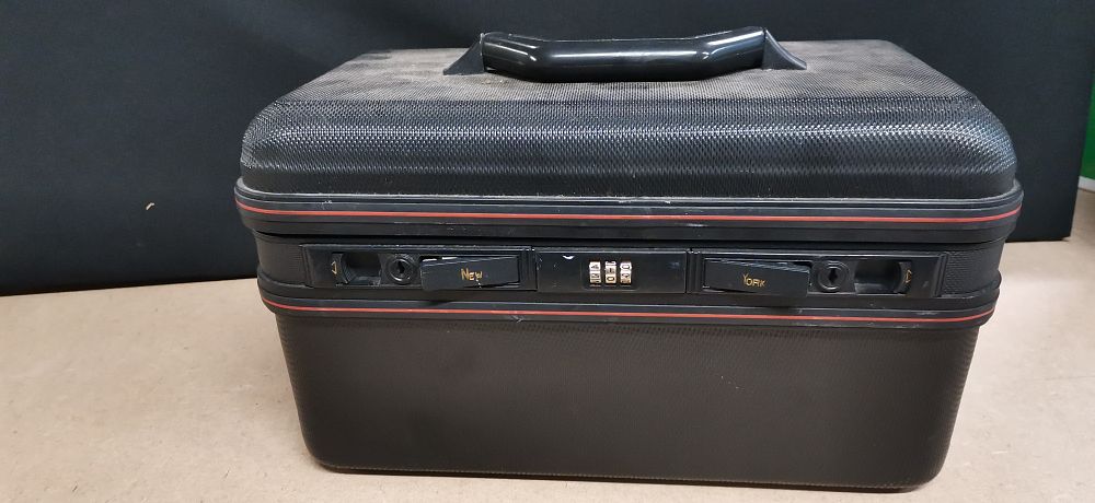 Lot 215: Black Hard Shell Vanity Case with New York Latches