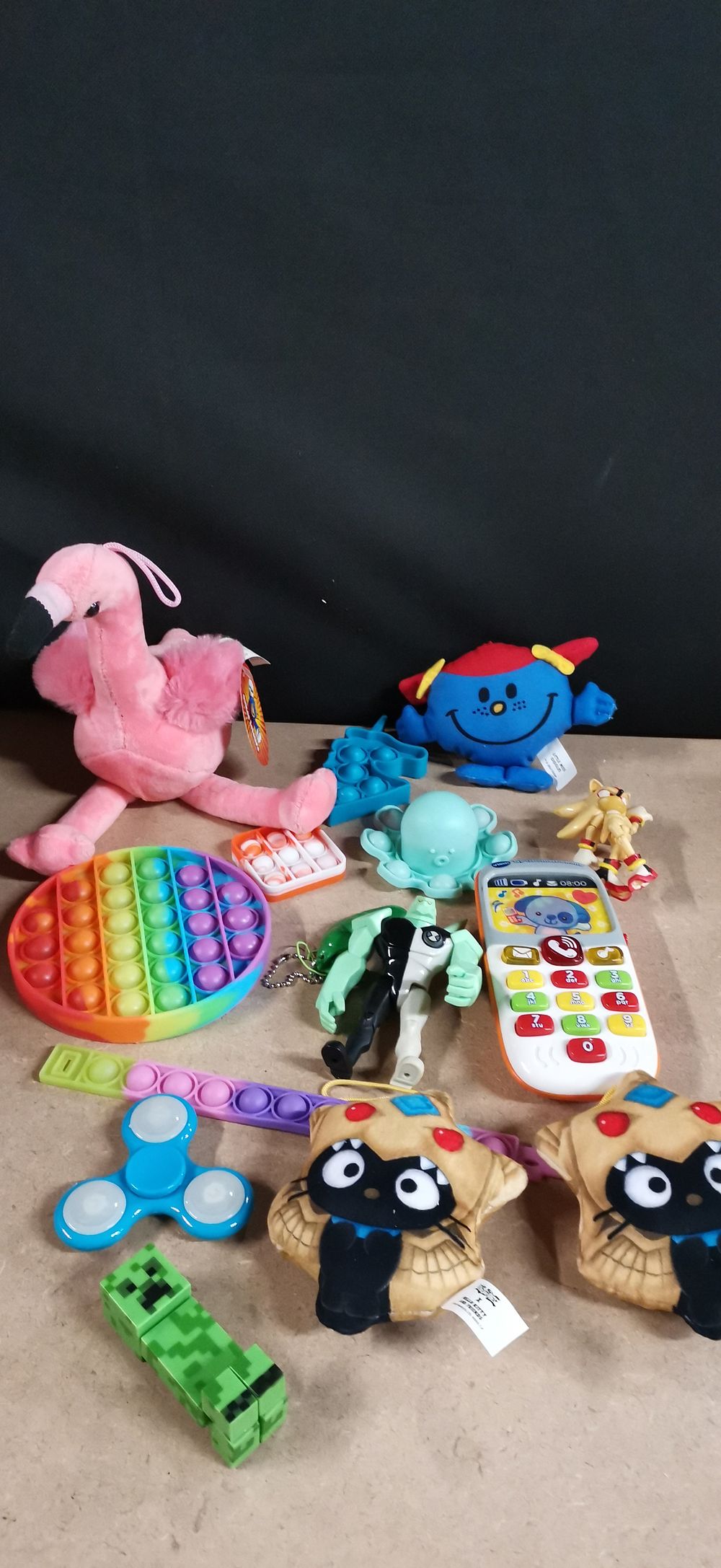 Lot 239: A Collection of Assorted Toys and Fidget Gadgets