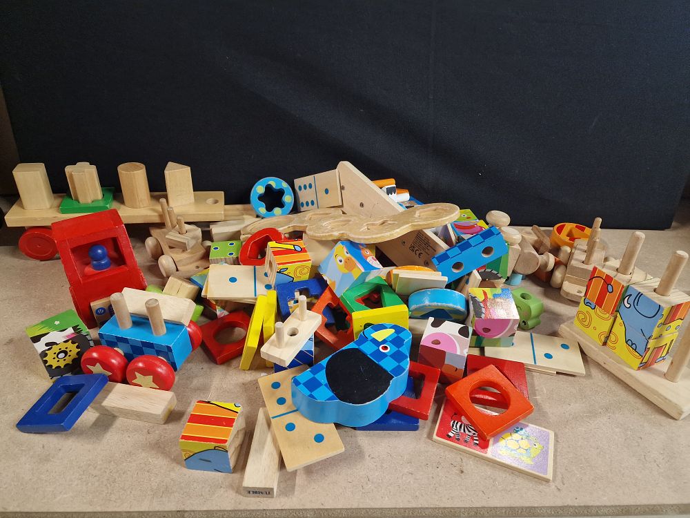 Lot 243: A Collection of Melissa and Doug Wooden Childrens Toys