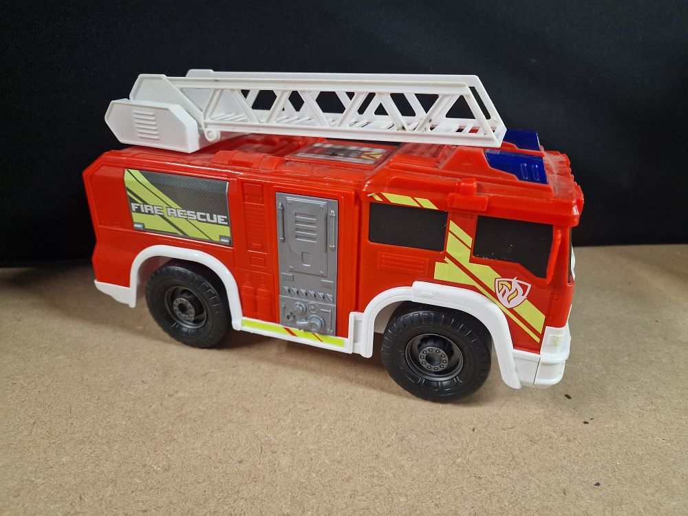 Lot 244: Red and White Plastic Toy Fire Rescue Truck