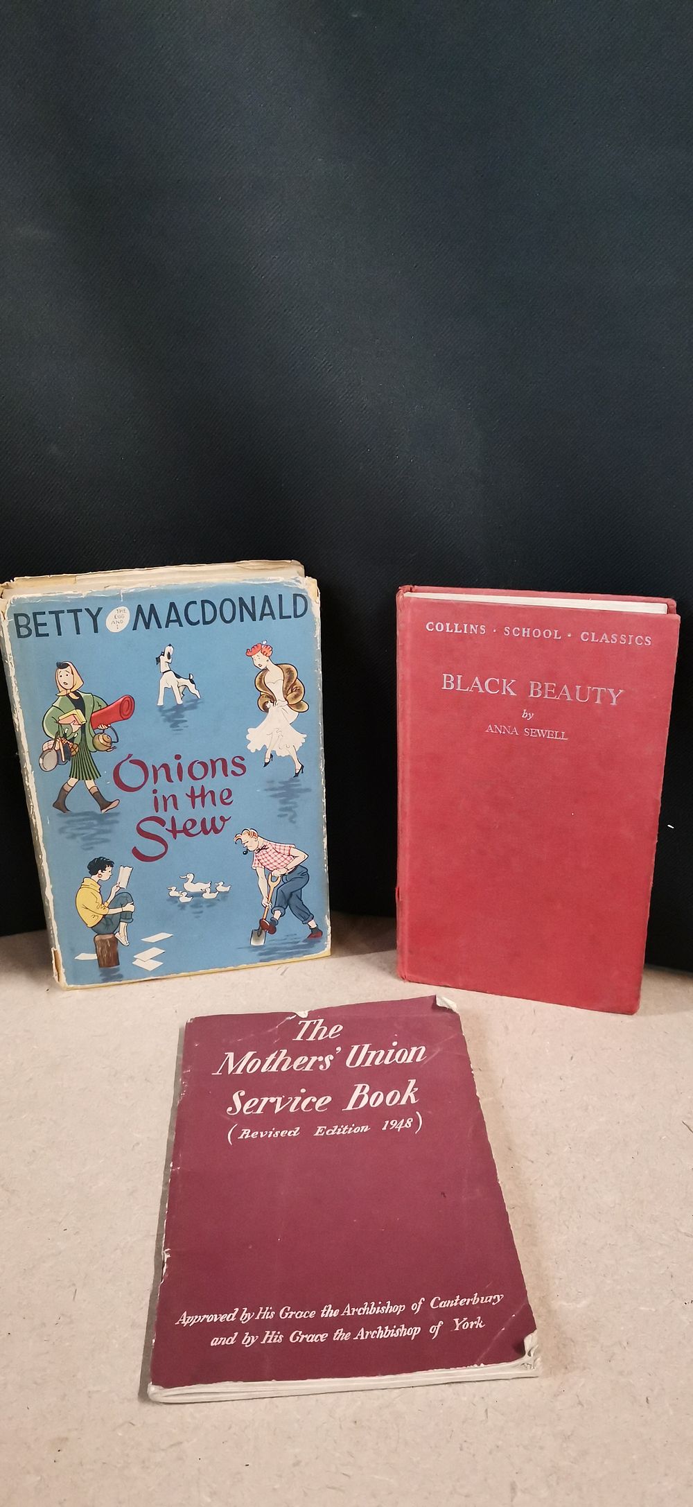 Lot 250: A Trio of Books Including Onions in the Stew
