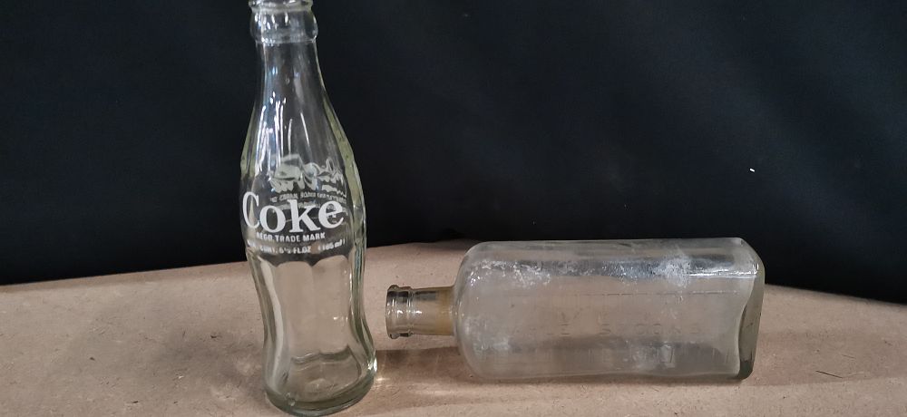 Lot 267: Two Vintage Glass Bottles Including Coca-Cola and Medicine Bottle