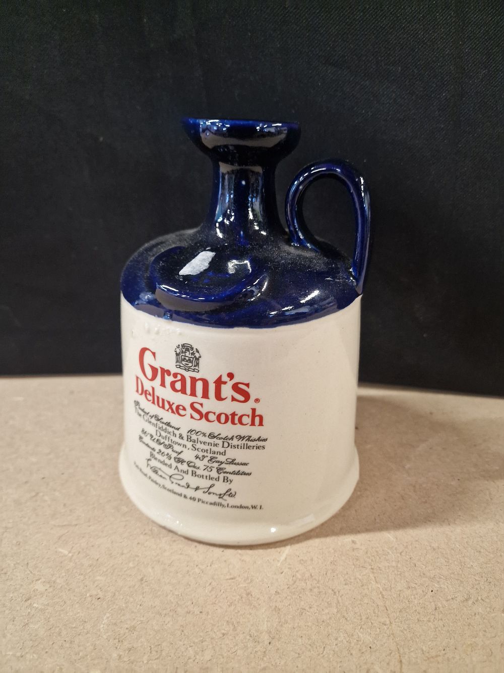 Lot 284: Grant's Deluxe Scotch Ceramic Miniature Jug