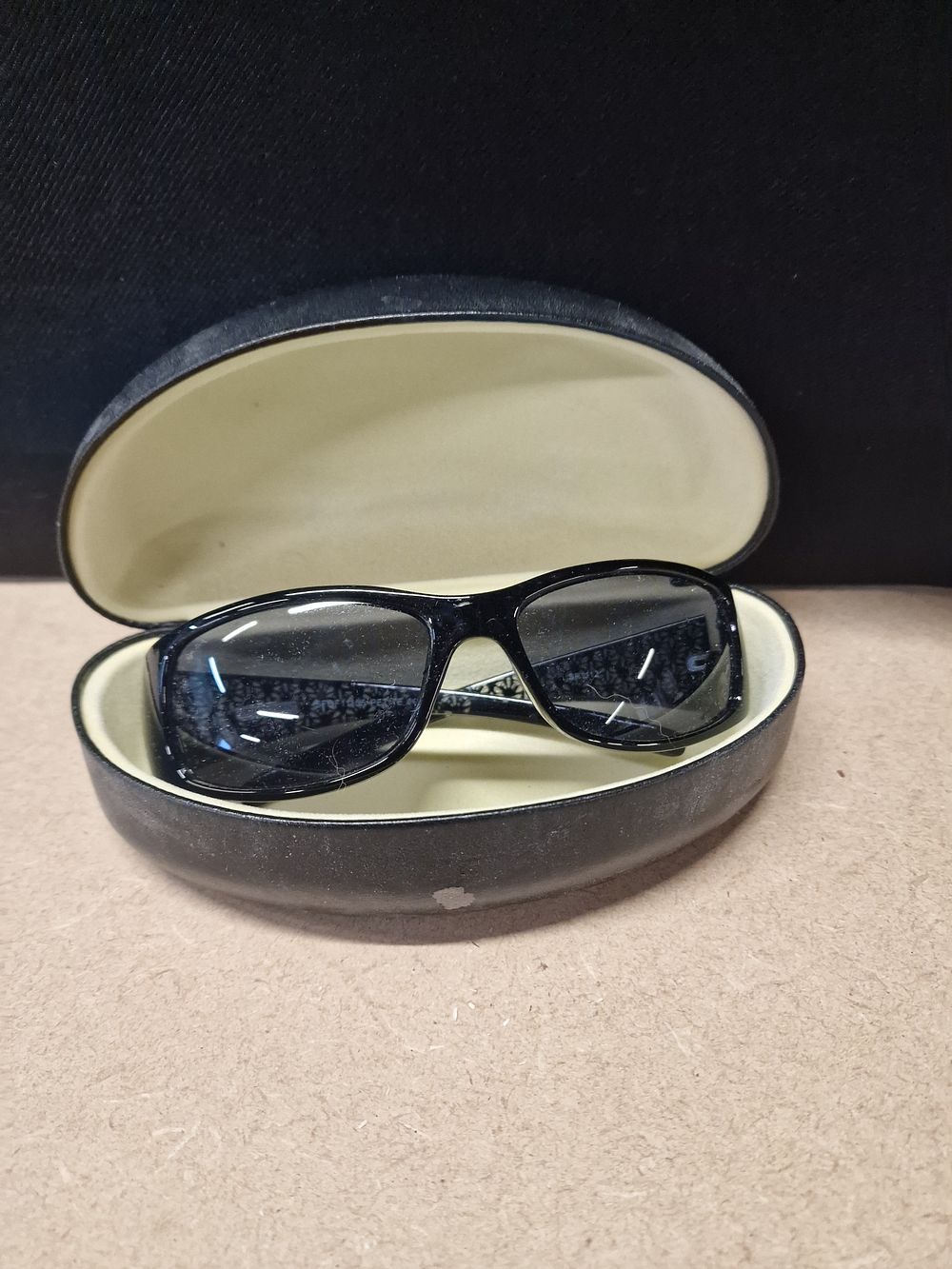 Lot 319: A Pair of Black Rectangular Sunglasses with Hard Case