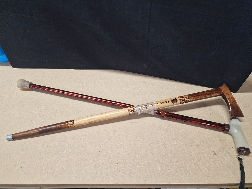 Lot 321: Two Walking Canes including an Axe-Style Cane