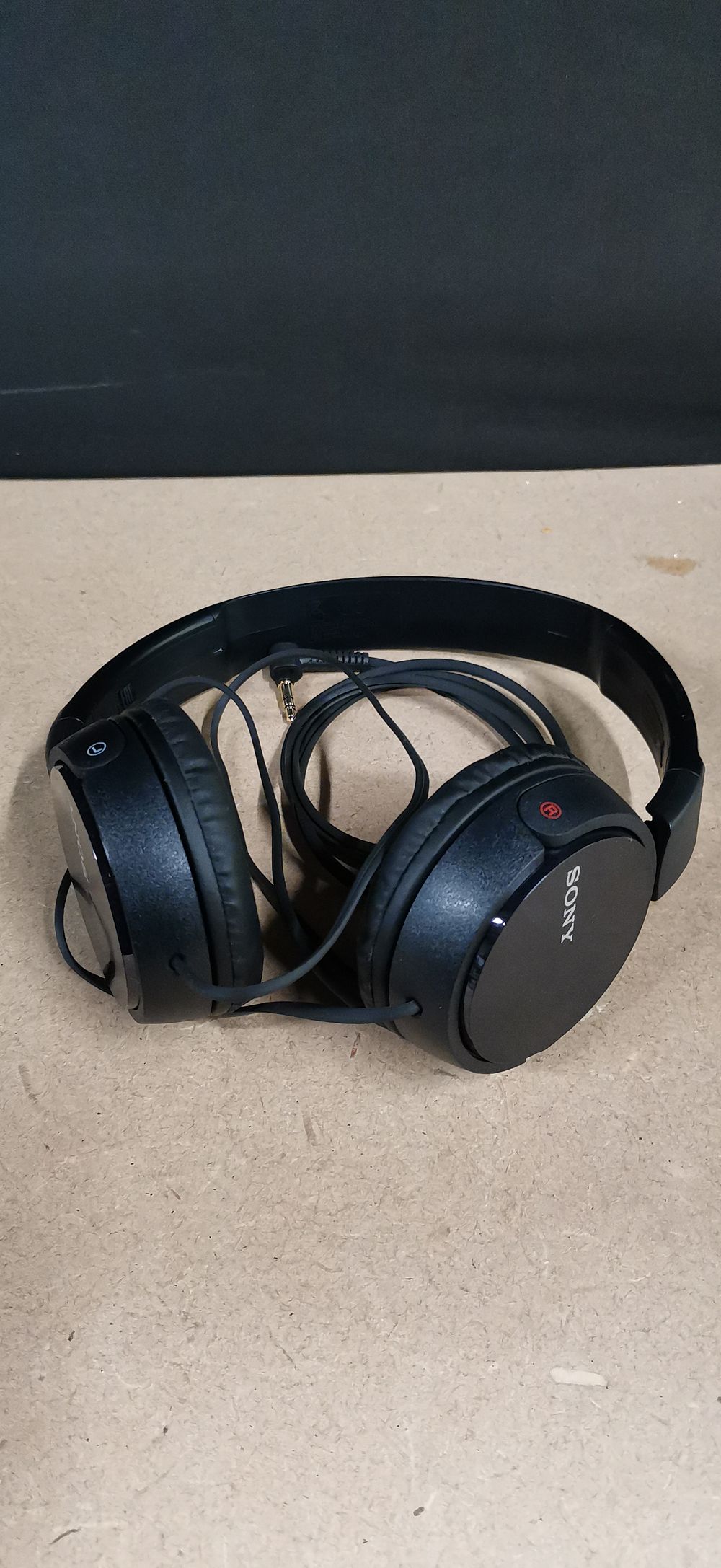 Lot 302: Sony MDR-ZX110NC Noise Cancelling Over-Ear Headphones