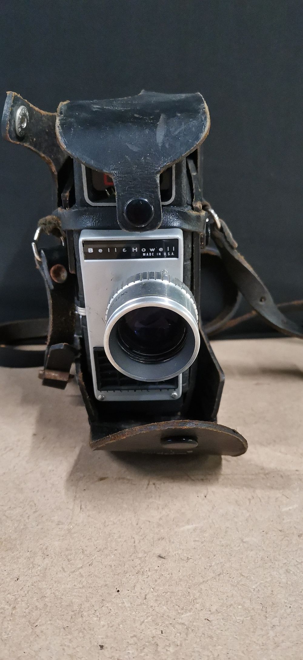 Lot 324: A Bell and Howell Movie Camera and Leather Case