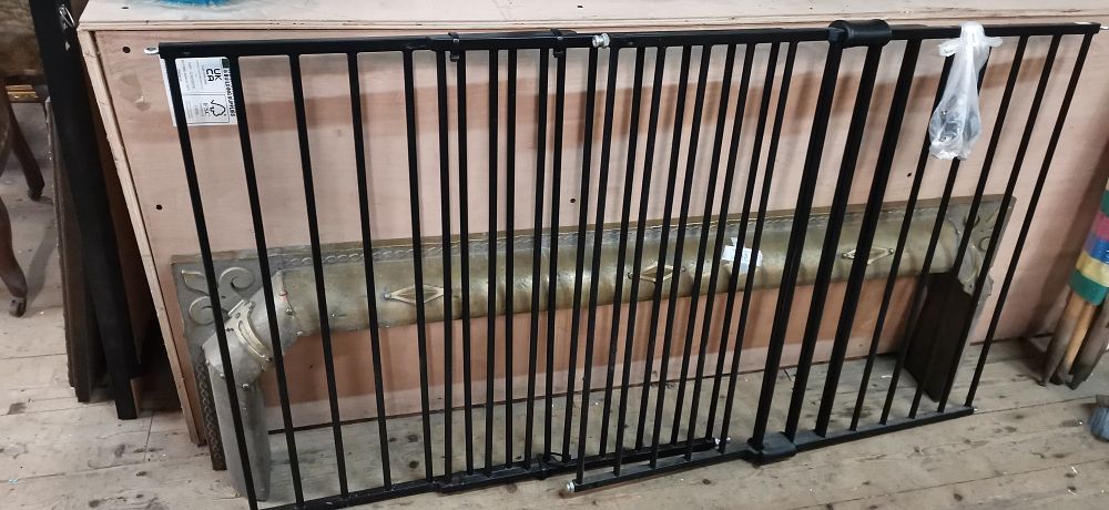 Lot 376: Pair of metal baby gates - can be extended to various sizes