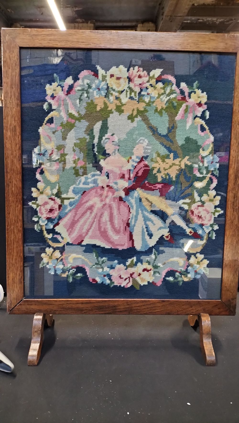Lot 228: A Needlepoint Fire Screen Depicting The Swing