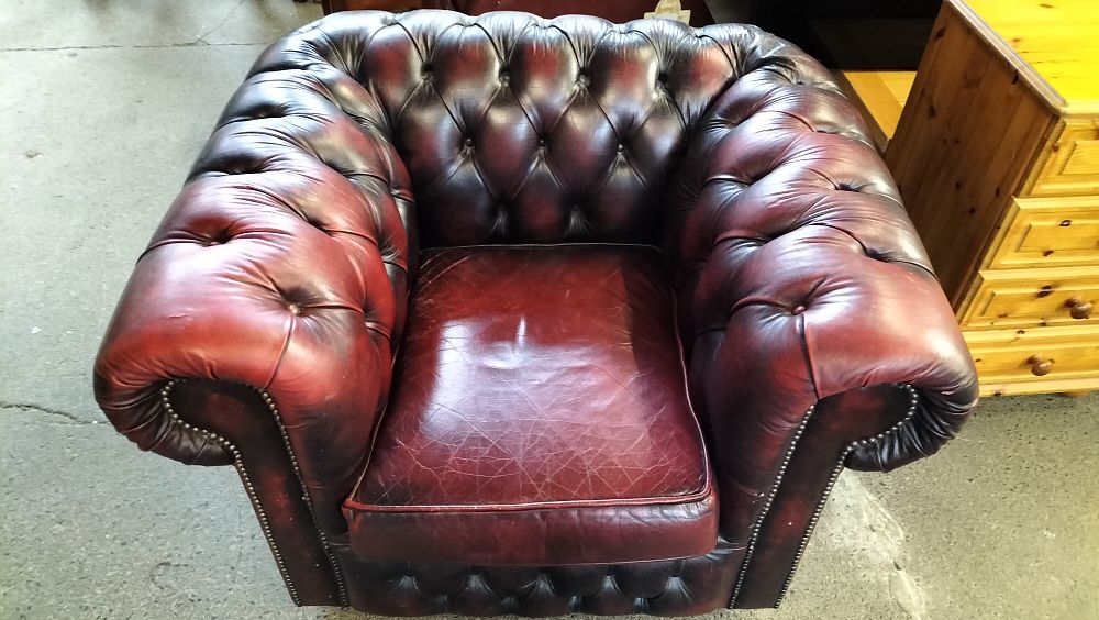 Lot 229: A Burgundy Leather Chesterfield Club Armchair