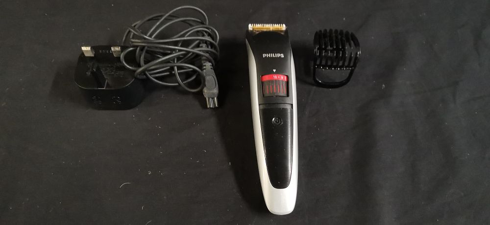 Lot 324: A Collection of Philips QT4013 Beard Grooming Items. Tested for Power