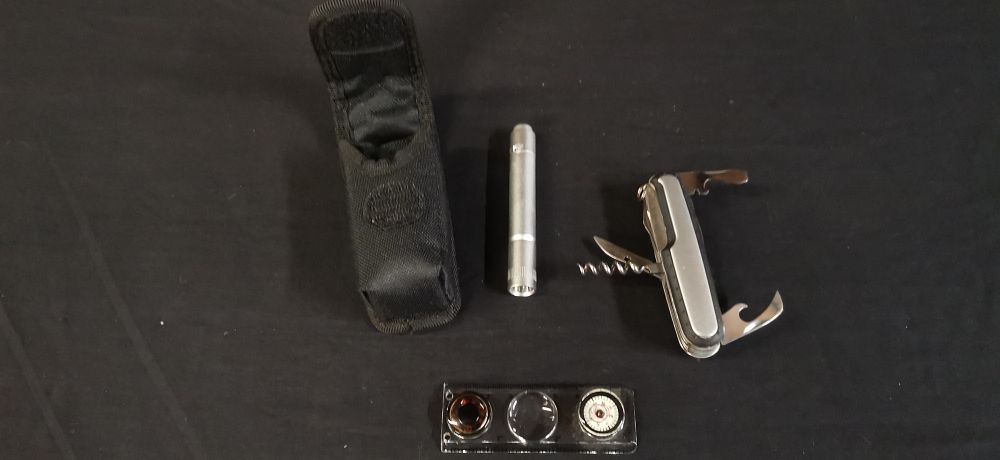 Lot 327: A Collection of Survival Style Tools and Fabric Pouch