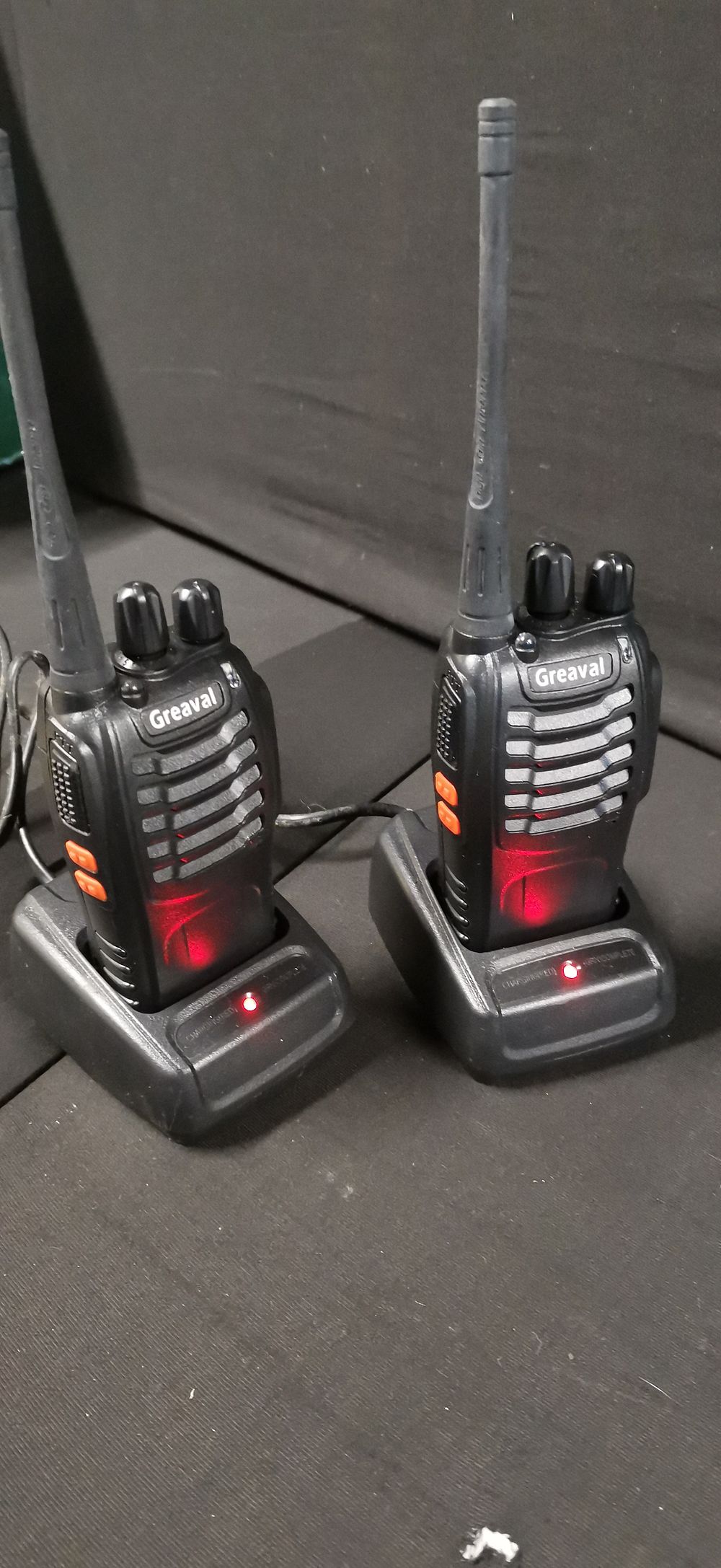 Lot 334: A Pair of Greaval Rechargeable Walkie Talkies with Charging Bases. Tested for Power