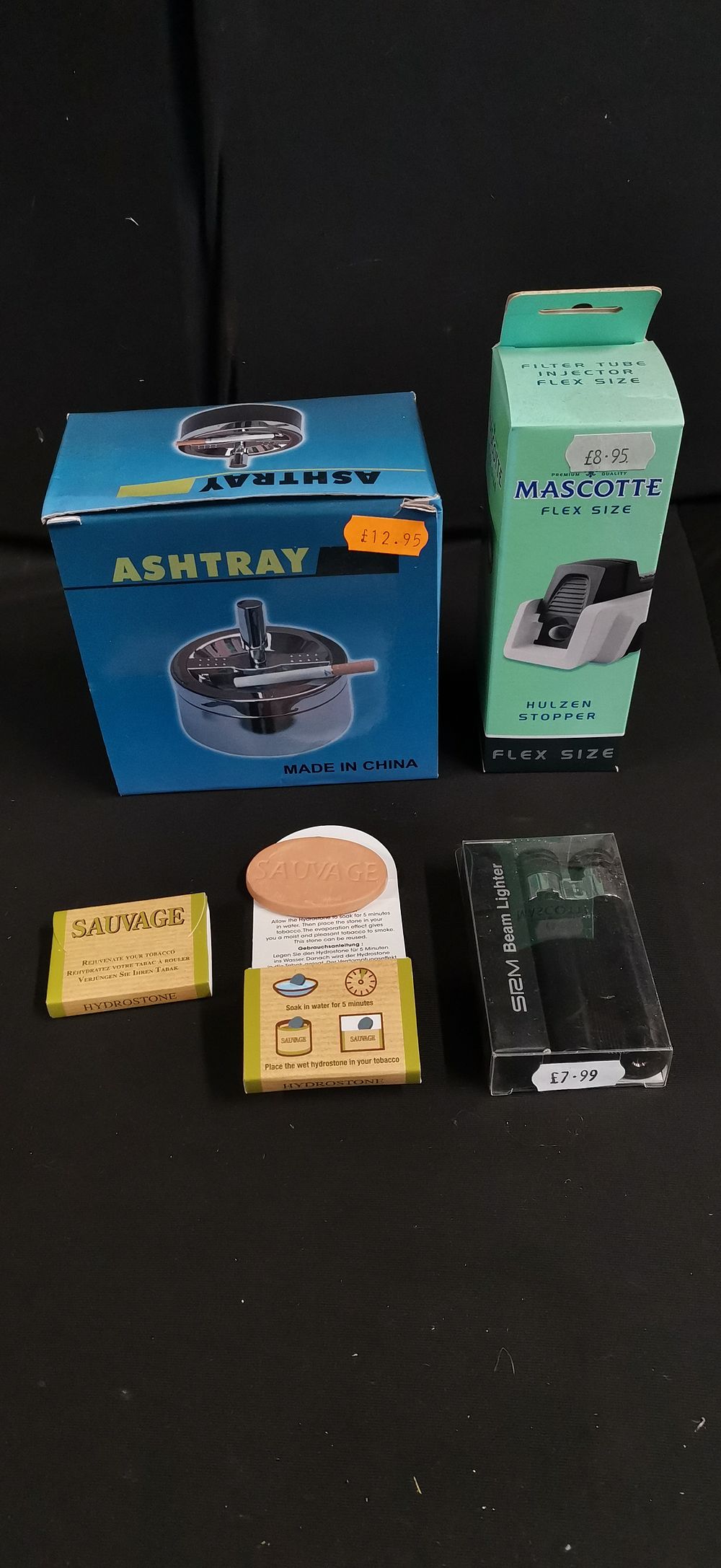 Lot 350: A Collection of Smoking Accessories Including Ashtray and Lighters