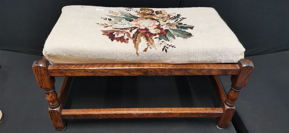 Lot 362: Vintage Floral Needlepoint Footstool with Turned Wooden Legs