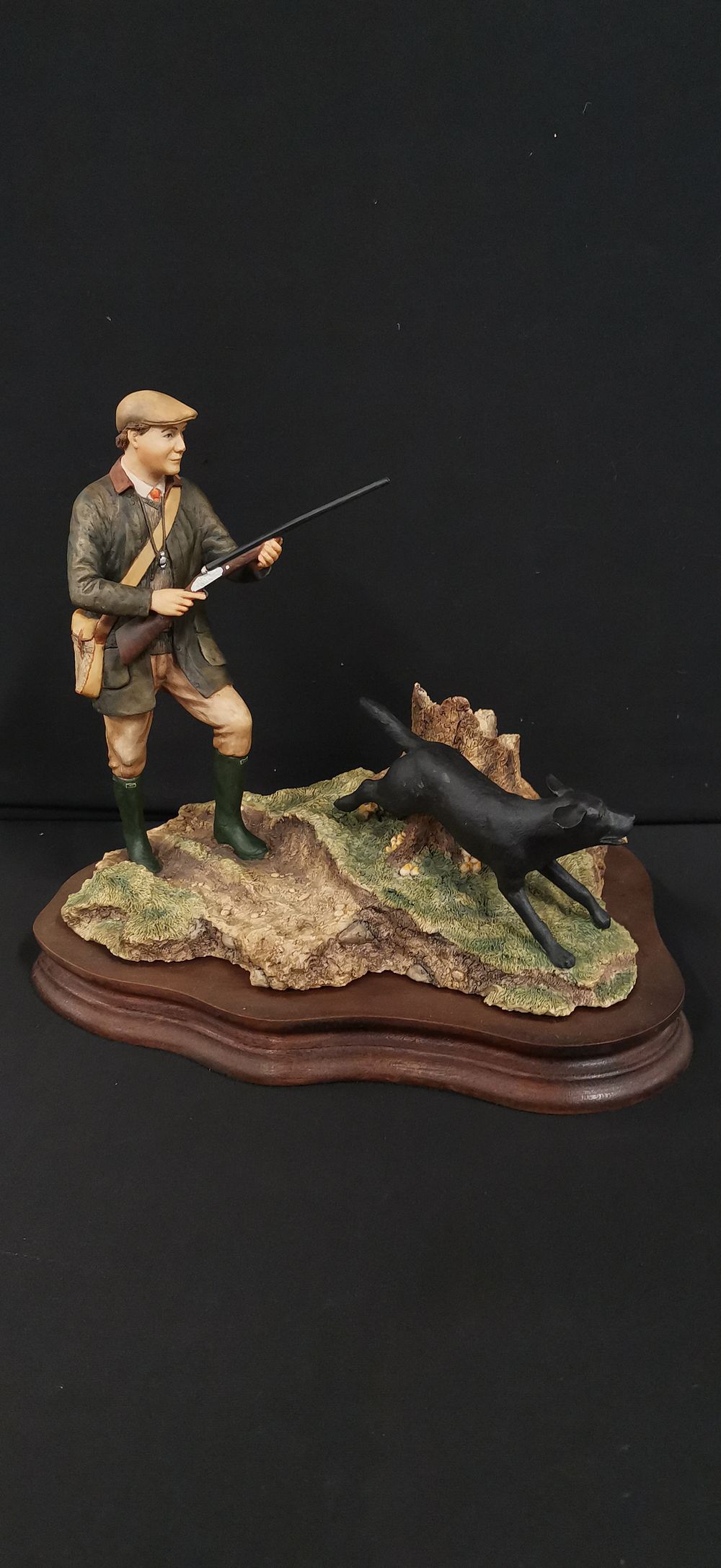 Lot 251: Border Fine Arts Figurine of a Hunter and Dog