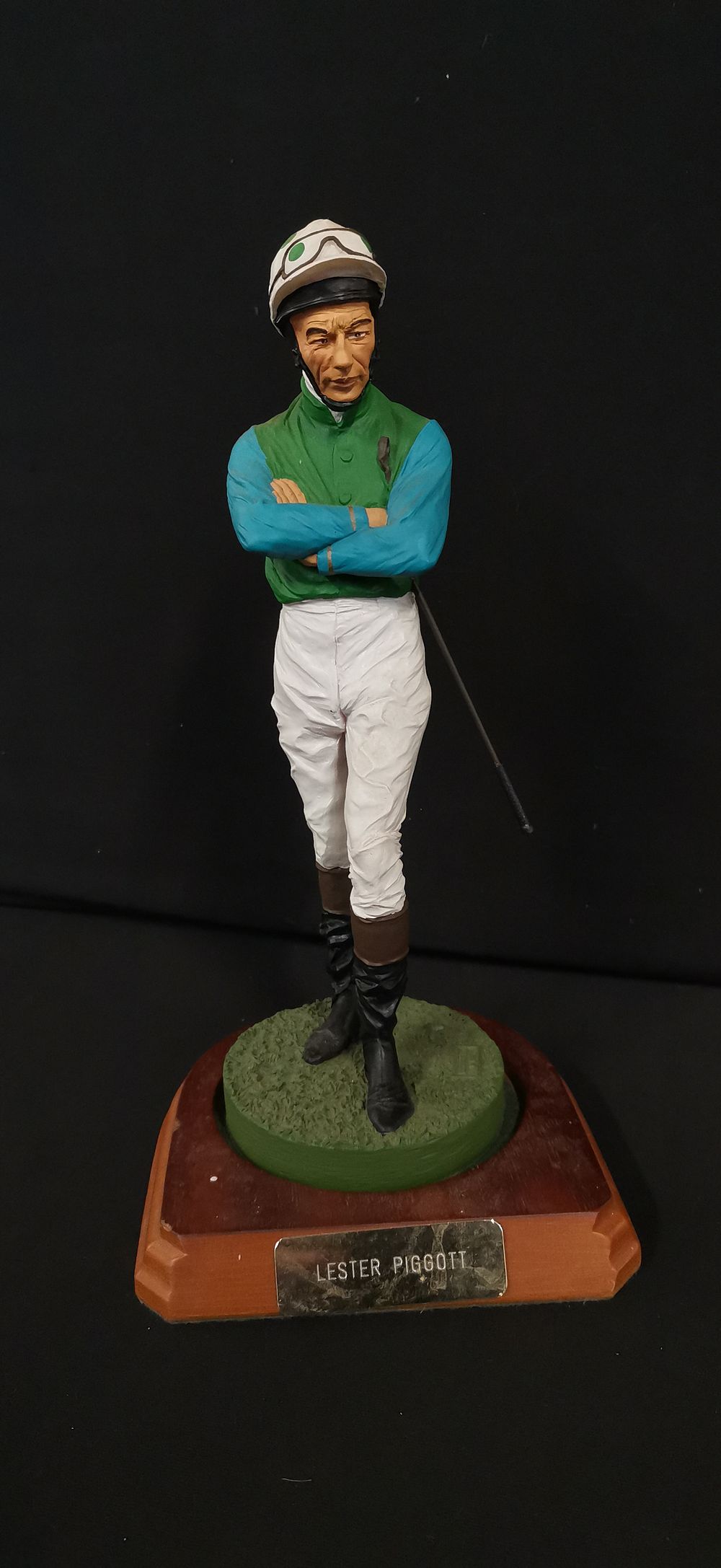Lot 261: A Painted Figurine of Jockey Lester Piggott