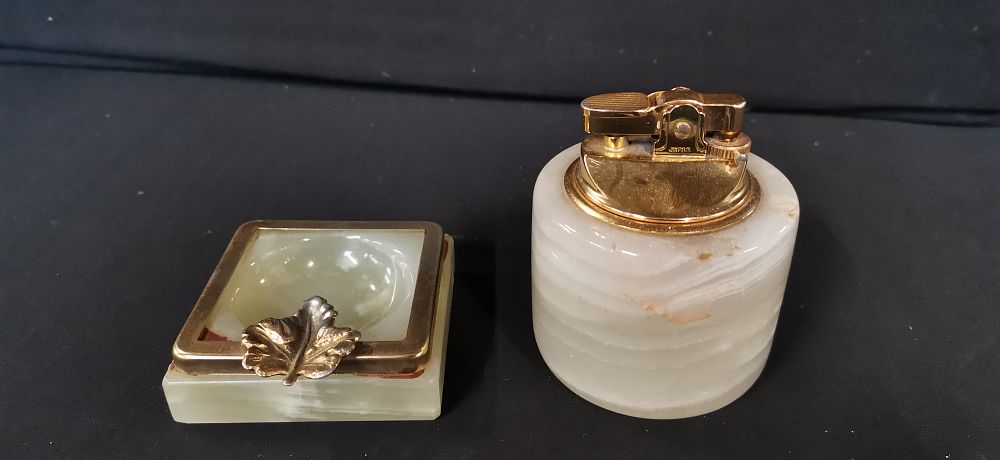 Lot 276: A Pair of White Onyx Smoking Accessories