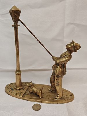 Cast Brass Figural Group of a Victorian Lamplighter with Terrier, Circa 1950-1970. A substantial 