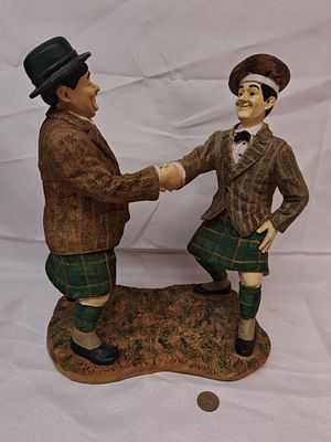 Laurel and Hardy Bonnie Scotland Themed Figurine. A large, hand-painted sculptural group 