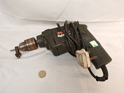 Skil Model 6225 3/8 Inch Corded Electric Rotary Hammer Drill. A vintage Skil corded electric 