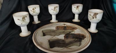 A Collection of Sue Todd Pottery Platter and Goblets. A collection of off-white studio pottery 