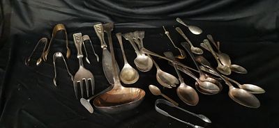 A Collection of Silver Toned Metal Serving Flatware. A collection of silver-toned metal serving 