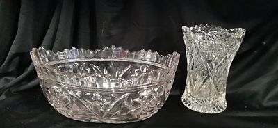 Two clear pressed uranium glass vessels with geometric patterns. Two clear pressed glass vessels 