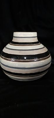 Striped Bulbous Ceramic Vase. A bulbous ceramic vase featuring horizontal stripes in white, grey 