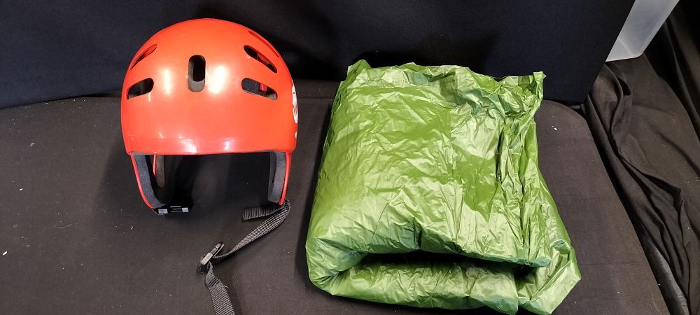 Lot 210: Two Items Including a Canoe Helmet and Waterproof Bag