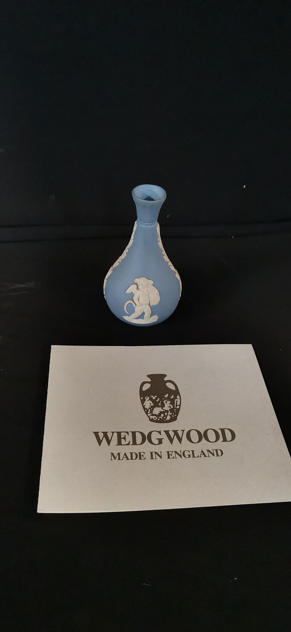 Lot 287: Wedgwood Blue Jasperware Miniature Cherub Bud Vase