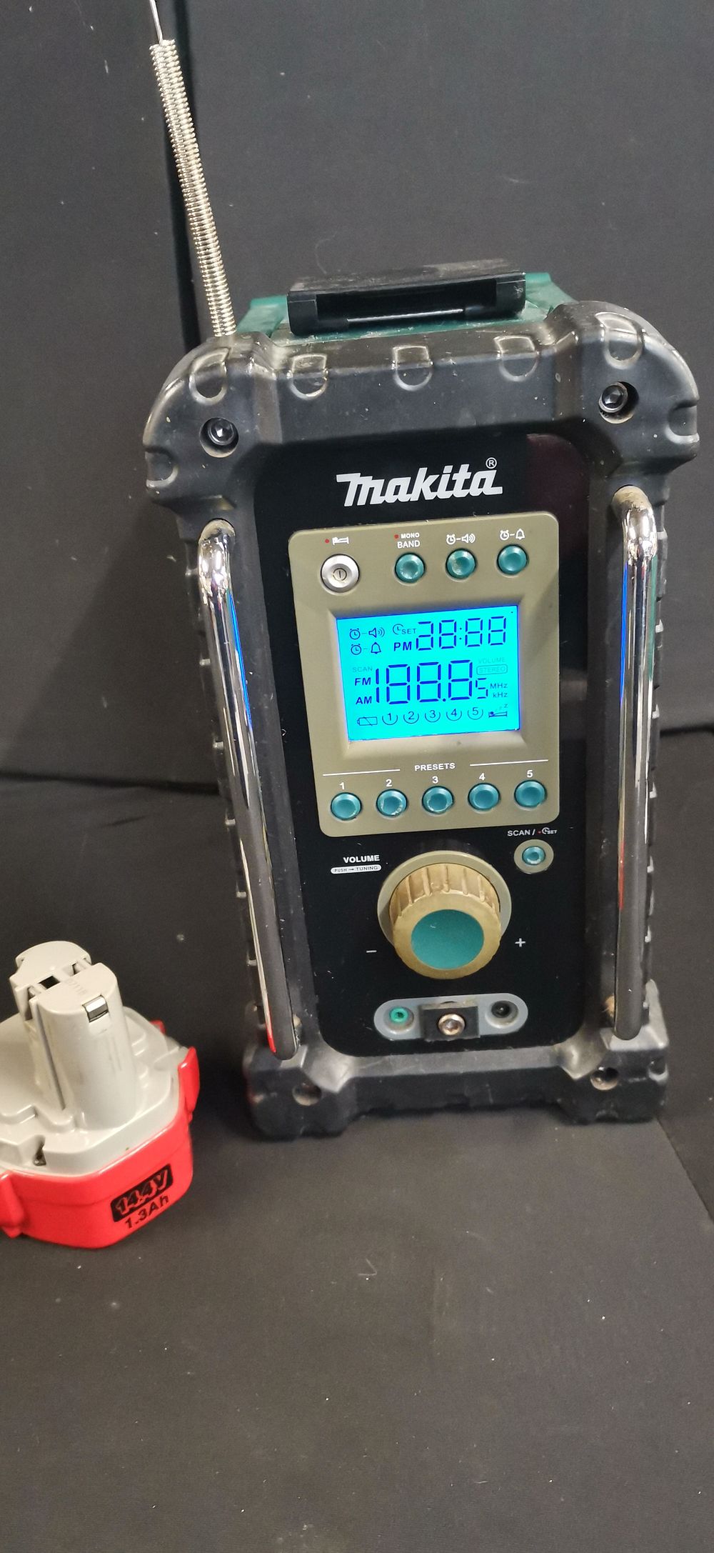 Lot 343: Makita BMR100 Jobsite Radio and a Spare  PA14 Battery. No Charger. Tested for Power