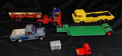 A Collection of Die-Cast Toy Vehicles and Accessories. A collection of die-cast toy vehicles 