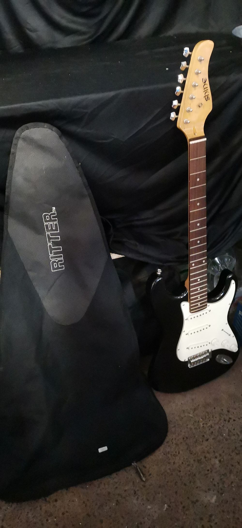 Lot 183: Two Items: Shine Electric Guitar and Ritter Soft Case