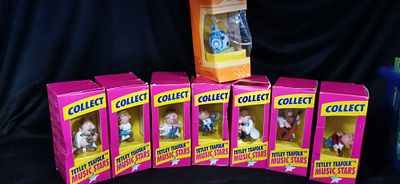 A Collection of Boxed Tetley Teafolk Music Stars Figurines. A collection of Tetley Teafolk Music 