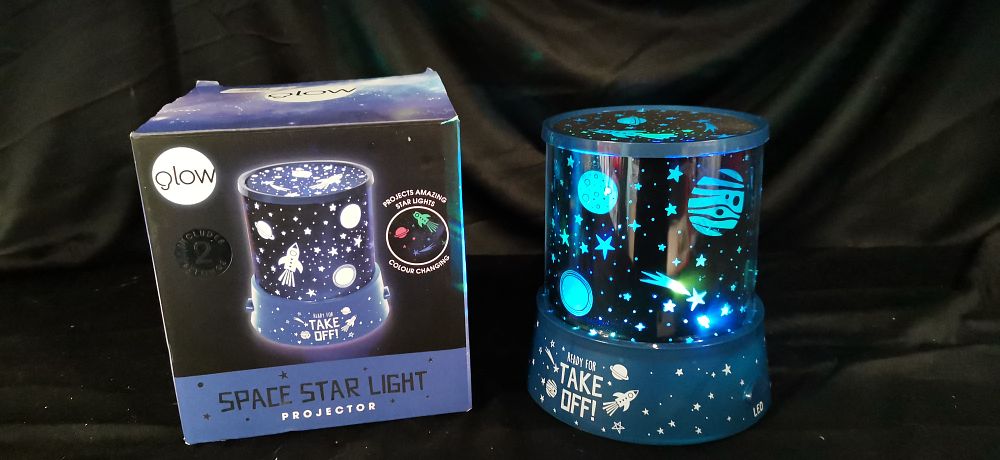 Lot 273: Glow Space Star Light Projector with Original Packaging