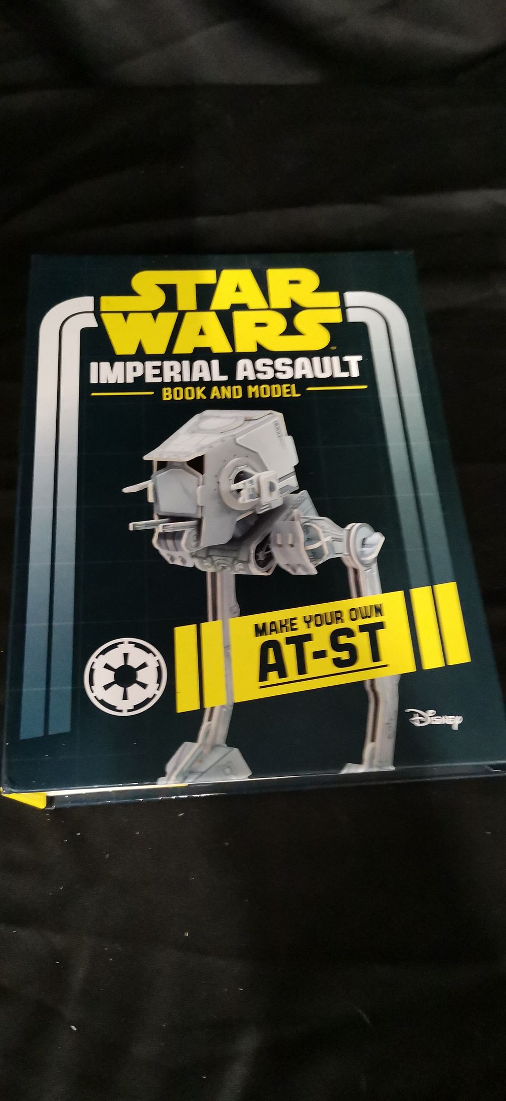 Lot 274: Star Wars Imperial Assault Activity Book and AT-ST Model