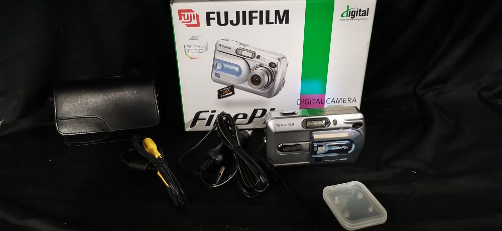 Lot 291: A Collection of Fujifilm FinePix A607 Digital Camera Equipment
