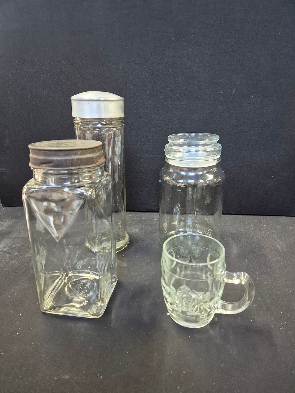 Lot 352: 3 Large Glass Storage Jars & One 1/2 Pint Tankard