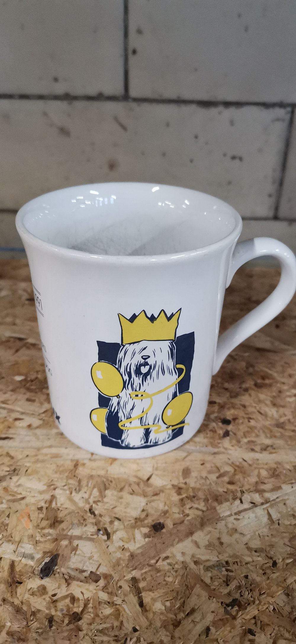 Lot 390: Thirty Years of The Dulux Dog Commemorative Ceramic Mug