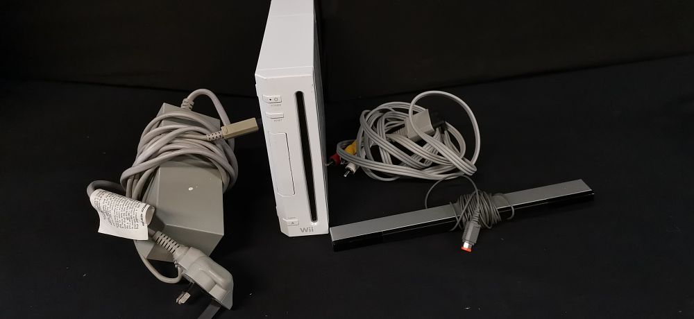 Lot 296: A Collection of Nintendo Wii Console and Accessories. Tested for Power