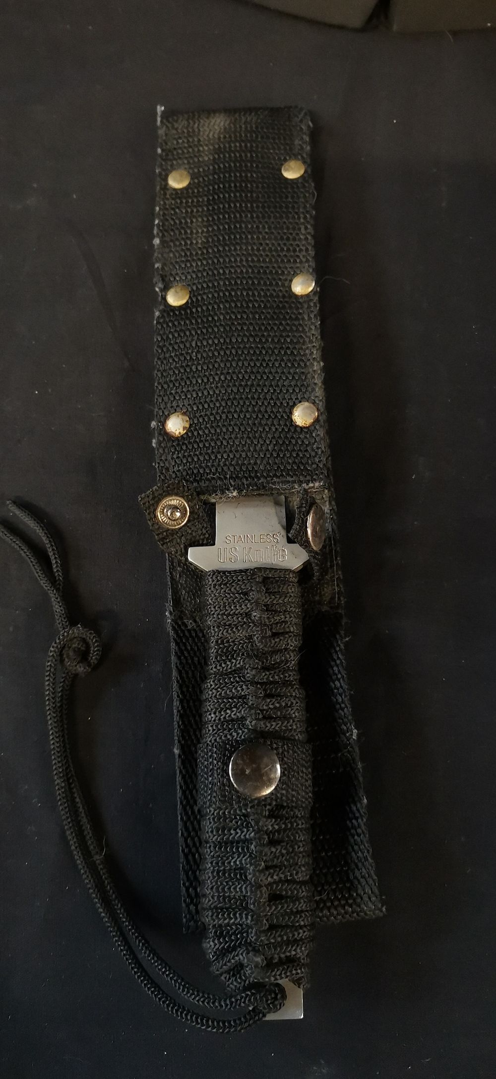 Lot 304: U.S.M.C. Marked Stainless Steel Tanto Knife with Paracord Handle. PROOF OF AGE REQUIRED