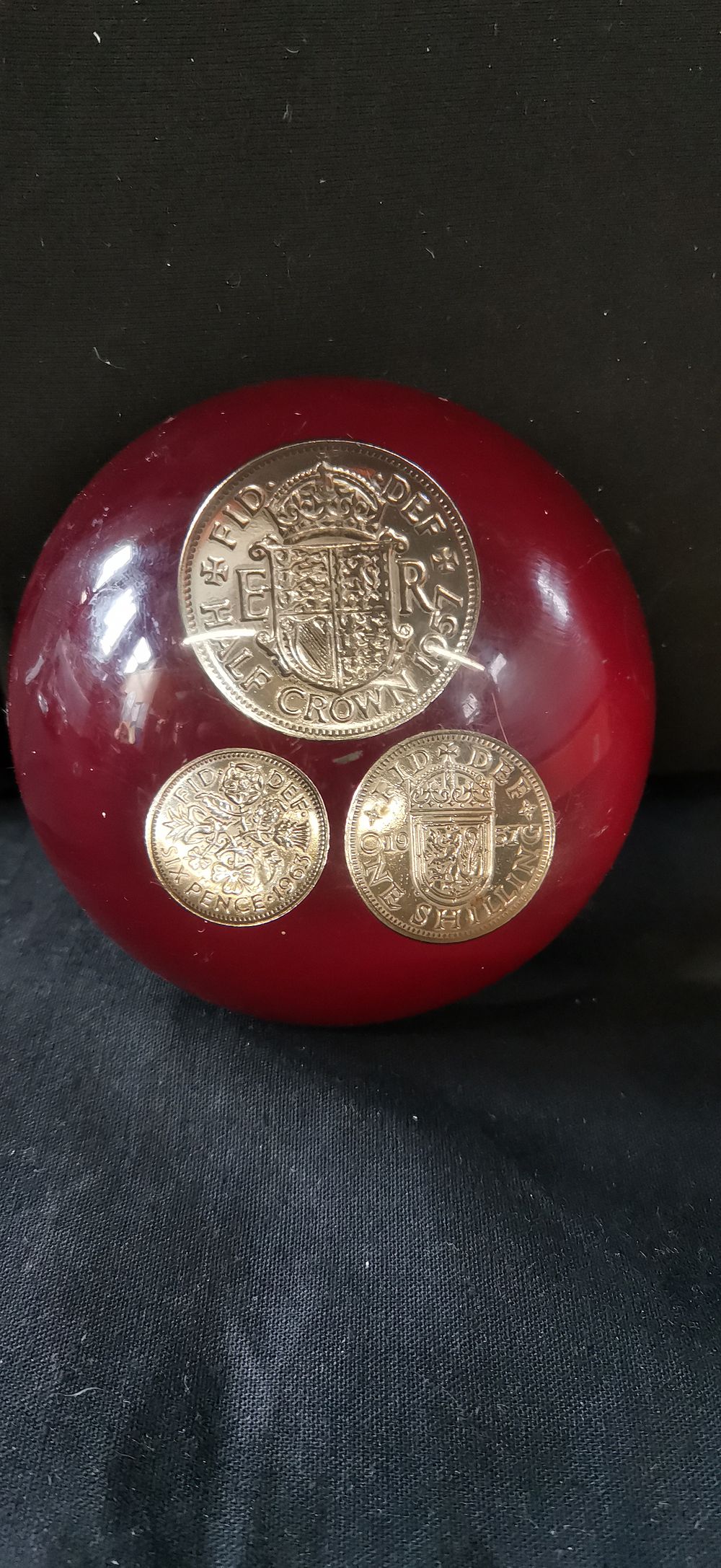 Lot 316: Red Domed Paperweight with Three British Coins